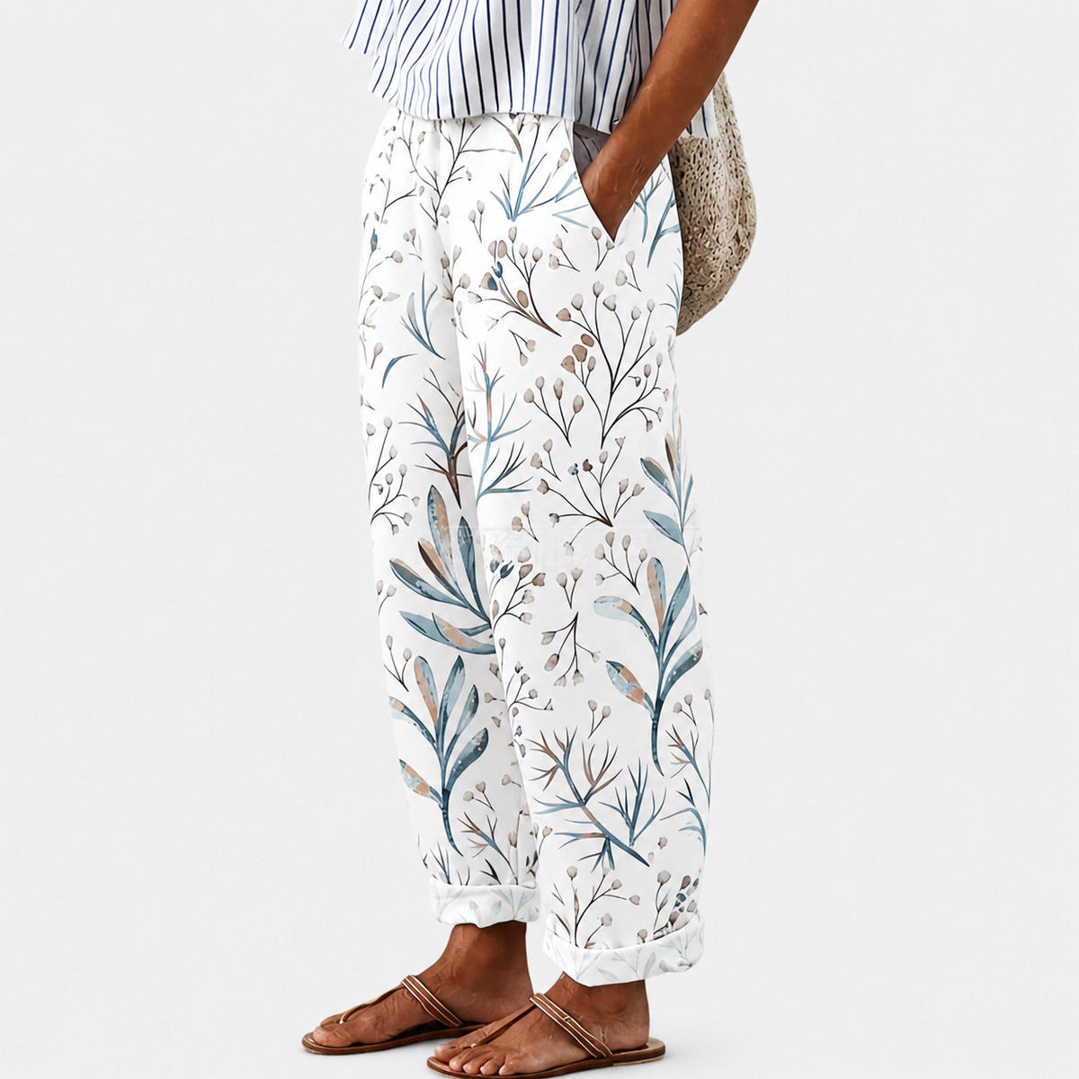 Comfortable trousers with botanical print in blue and beige