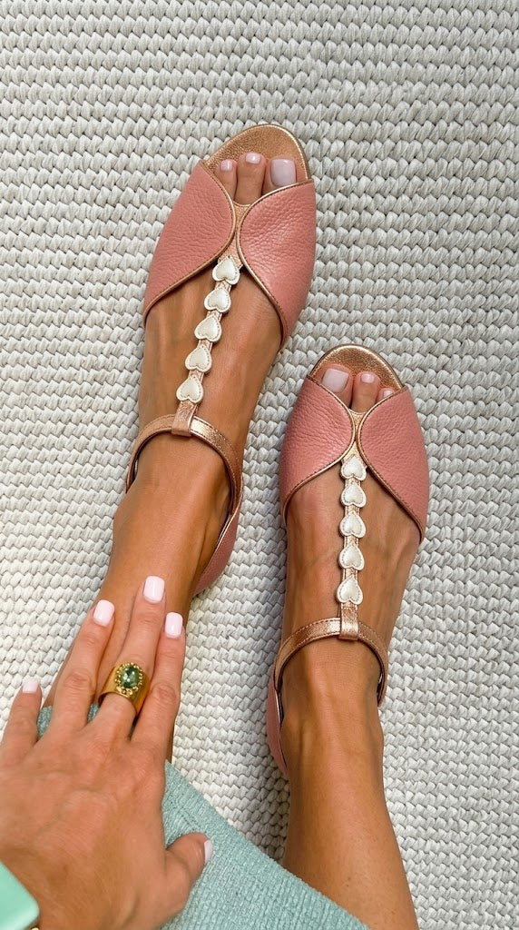 Pink low peep toe sandals with T-strap and heart detail