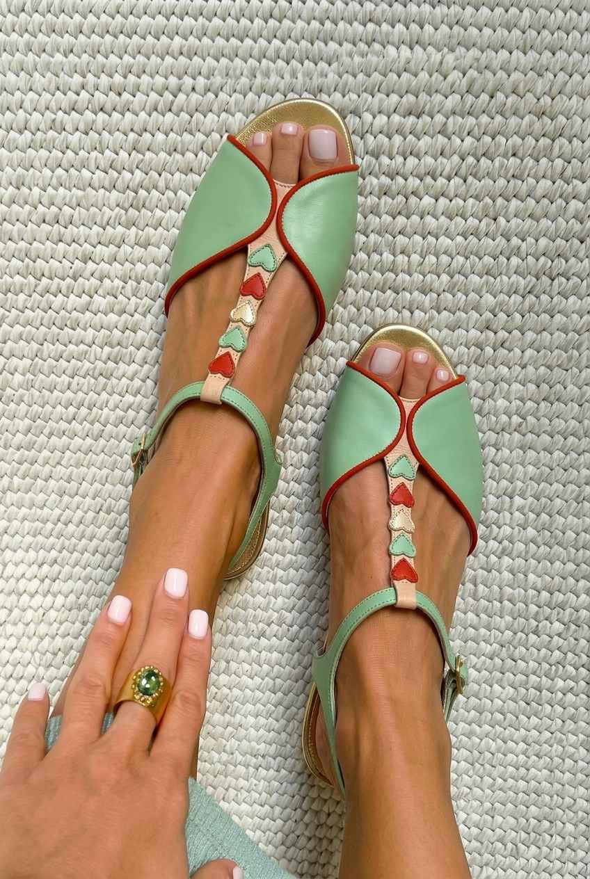 Low peep toe slingback sandals with heart-shaped detail