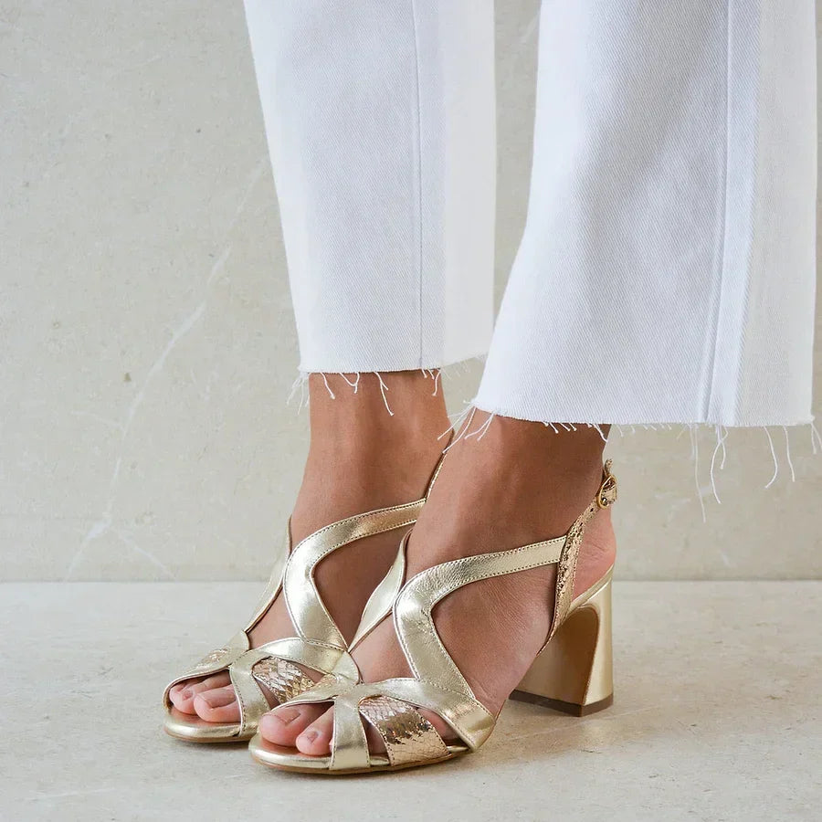 Wide cut-out peep toe heels with a glittery irregular design