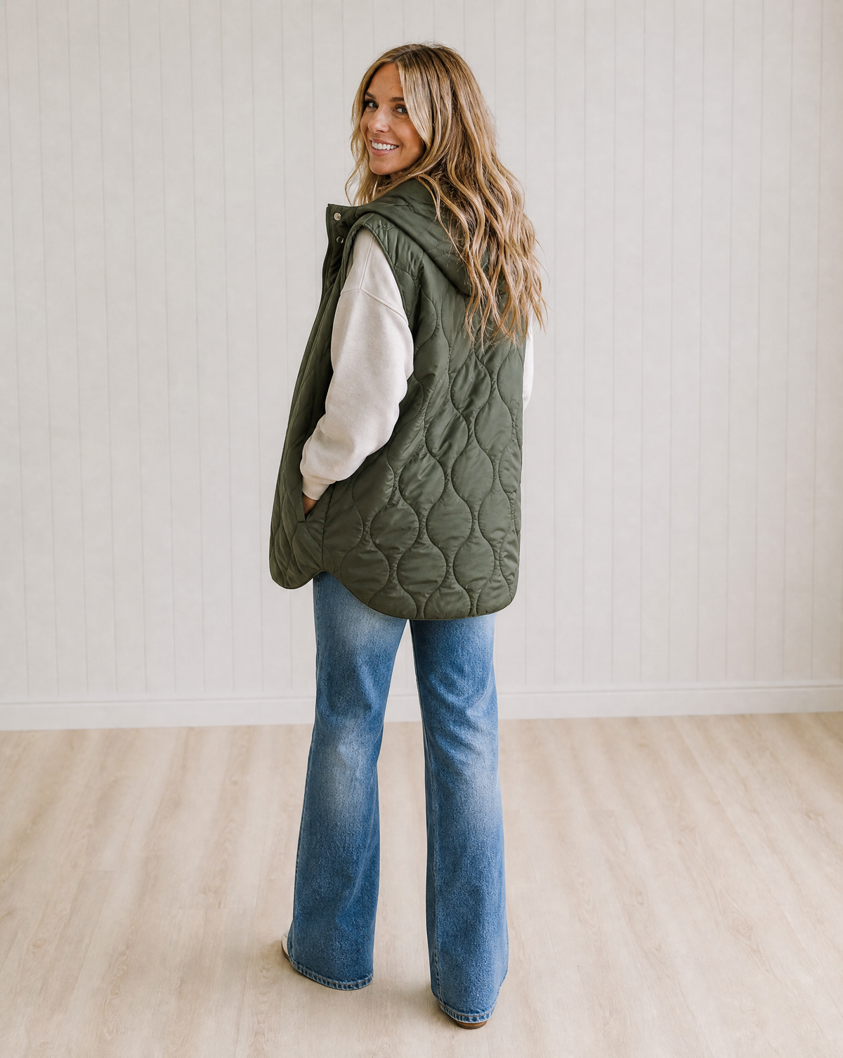 Women's Quilted Hooded Puffer Vest with Zip and Snap Buttons