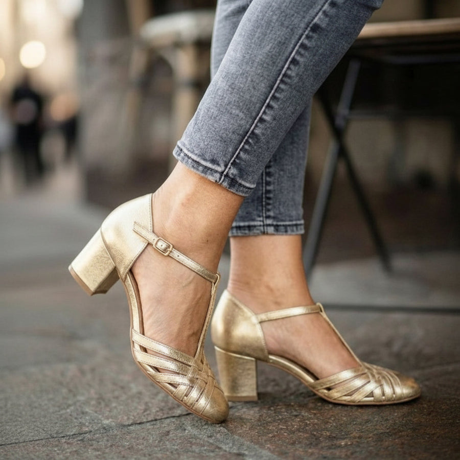 Elegant metallic Mary Jane court shoes with a T-strap and block heel