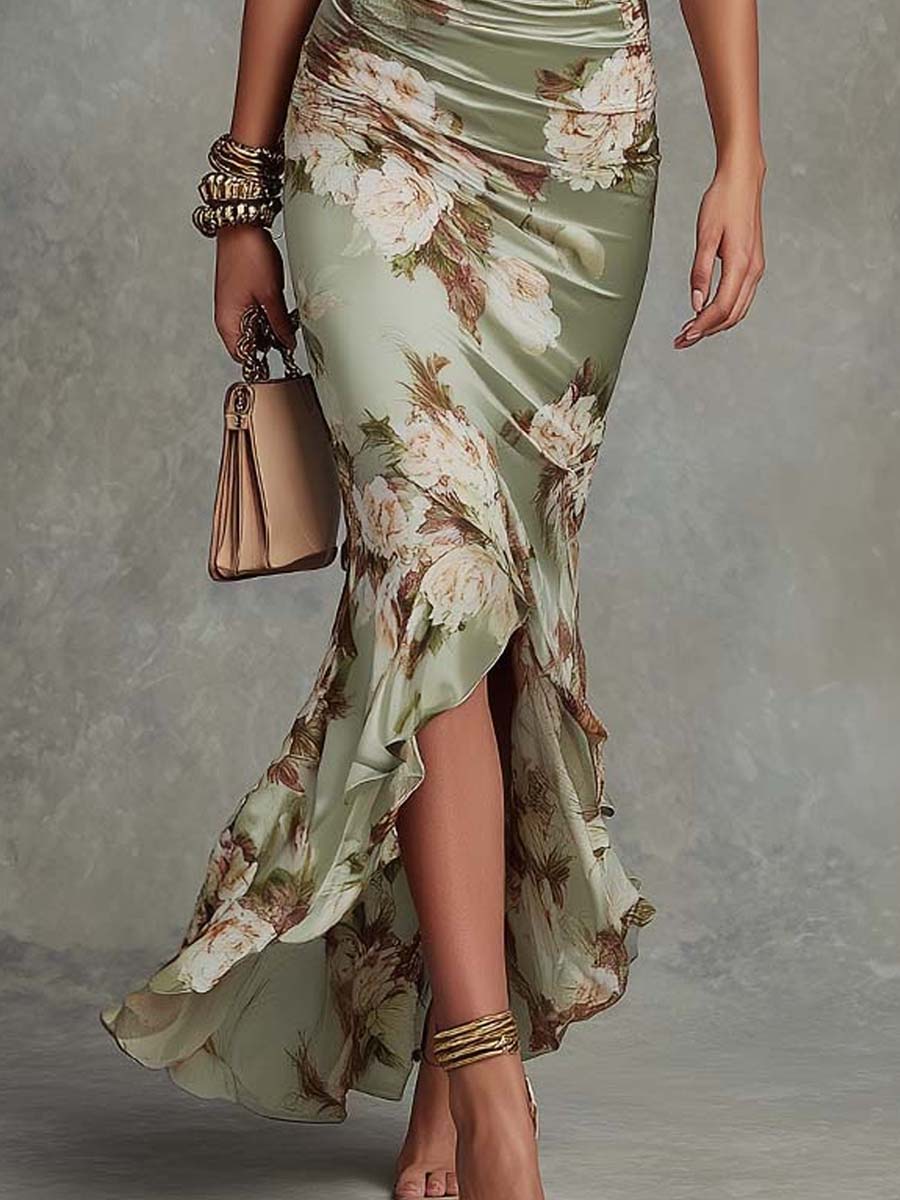 Anne | Long asymmetric satin dress in green with V-neck, puff sleeves, and floral print
