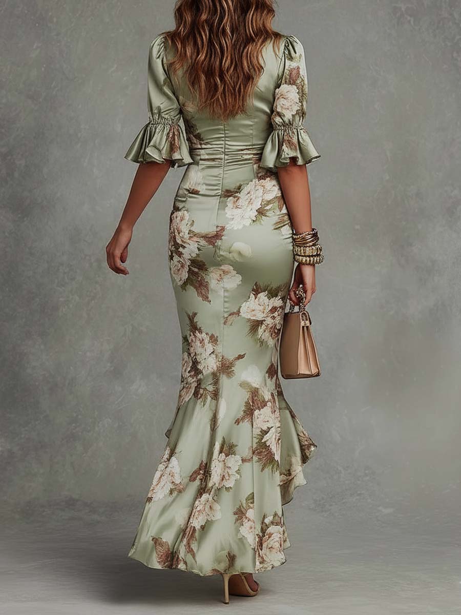 Anne | Long asymmetric satin dress in green with V-neck, puff sleeves, and floral print