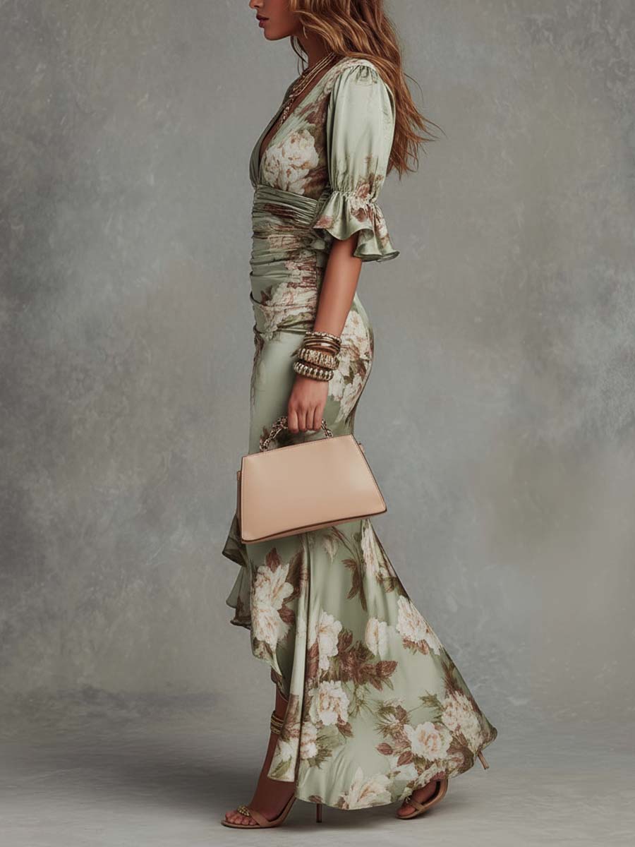 Anne | Long asymmetric satin dress in green with V-neck, puff sleeves, and floral print