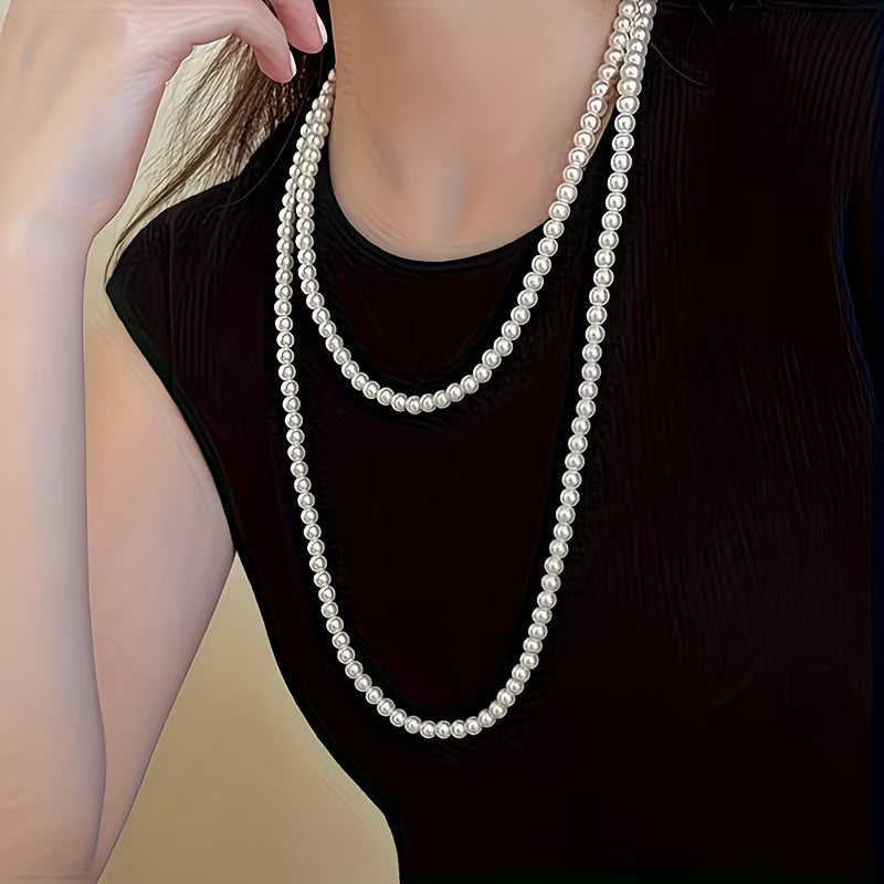 Timeless necklace with double pearl